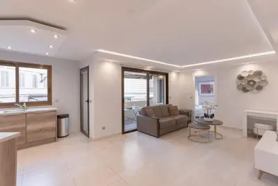 a living room with a couch and a table at 