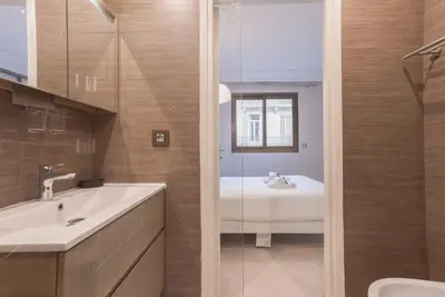 a bathroom with a sink and a mirror at 