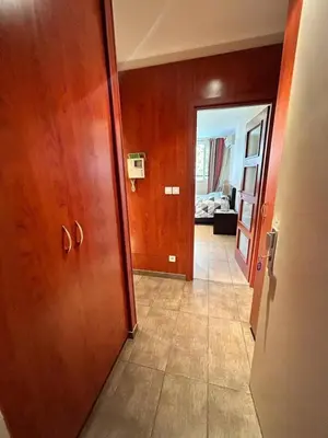 a hallway with a door leading to a room at Carnot in Cannes