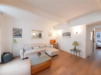 a living room with a couch and a table at Gloria in Cannes