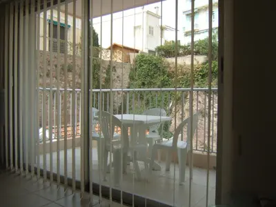 a view of a balcony with a table and chairs at Eden Residence in Cannes