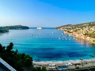 a view of a beach with boats in the water at Fiorella's Cannes Oasis in Cannes