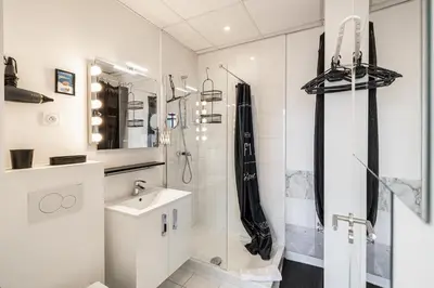a bathroom with a shower and a sink at PRIVATE - Small studio for two at 5 minutes from Croisette in Cannes