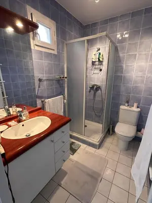 a bathroom with a shower and a sink and a toilet at 2 bedroom apartment with a pool in the heart of Cannes easy walk to the main beach on La Croisette - 2191 in Cannes