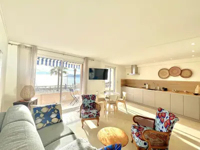 a living room with a couch and a table at Shelly luxury sea view by Welcome to Cannes in Cannes