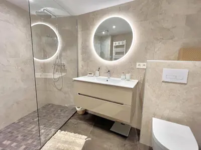 a bathroom with a sink and a mirror at Shelly luxury sea view by Welcome to Cannes in Cannes