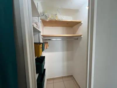 a small closet with a shelf and some boxes at Savannah appartement proche Carlton, by Welcome to Cannes in Cannes