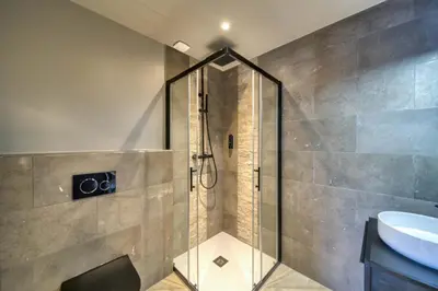 a shower with a glass door in a bathroom at Marvellous 5 bed Cannes Centre in Cannes
