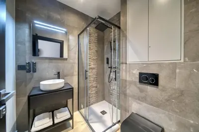 a bathroom with a sink and a shower at Marvellous 5 bed Cannes Centre in Cannes