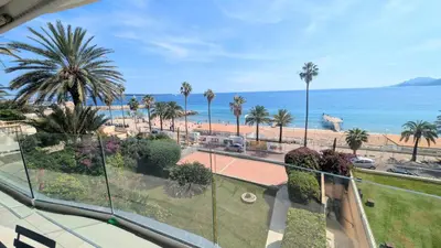 a balcony with a view of the beach and the ocean at Ref BELLAMARE in Cannes