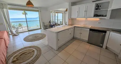 a kitchen with a view of the ocean at Ref BELLAMARE in Cannes
