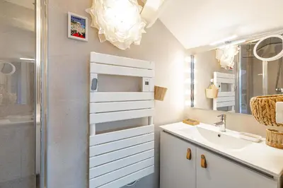 a bathroom with a sink and a shower at WELCOME - Stunning 2-bedroom at 5 minutes from Palais des Festivals in Cannes