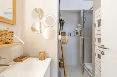 a bathroom with a sink and a shower at WELCOME - Stunning 2-bedroom at 5 minutes from Palais des Festivals in Cannes