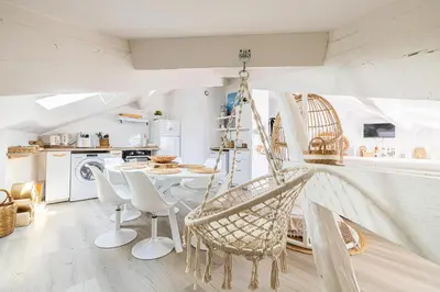 a room with a table and chairs in a kitchen at WELCOME - Stunning 2-bedroom at 5 minutes from Palais des Festivals in Cannes