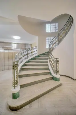a spiral staircase in a building with a stair case at Le Ed- Croisette - Parking - VCA in Cannes