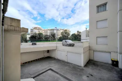 a parking lot with a car parked on a balcony at Le Ed- Croisette - Parking - VCA in Cannes