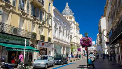 a busy city street with cars parked on the street at GuestRoom - Chambre d'hôte in Le Cannet