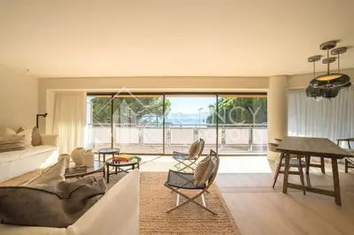 a living room with a couch and a table at Superbe Appartement, Croisette in Cannes