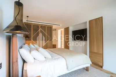 a bedroom with a white bed with white pillows at Superbe Appartement, Croisette in Cannes
