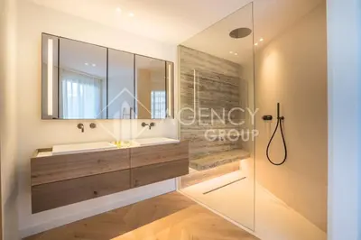 a bathroom with a sink and a mirror at Superbe Appartement, Croisette in Cannes