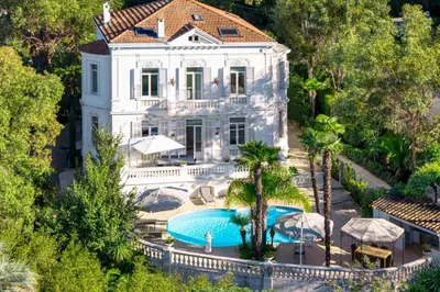 an aerial view of a house with a swimming pool at REF 1981 - Cannes Center - Particular town house for rent in Cannes