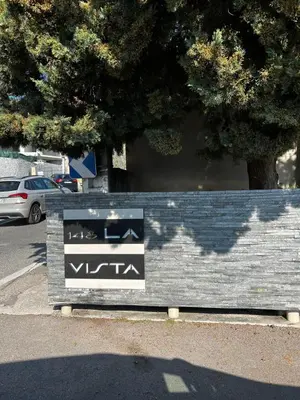 a sign on the side of a parking lot at WE CANNES ! Amazing Sea View 2 Bedrooms La Vista in Cannes