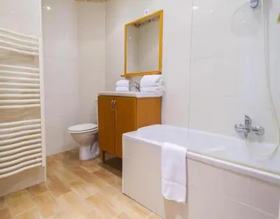 a bathroom with a tub and a toilet and a sink at NEW Cannes Apt - Amazing Location - La Croisette in Cannes