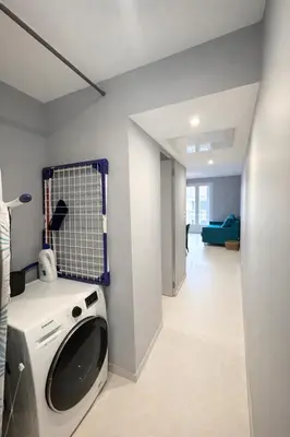 a laundry room with a washer and dryer at Suite Suquet plage - 5 places in Cannes