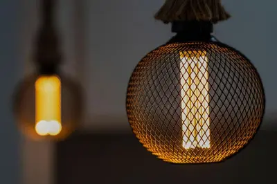 two lights that are hanging from a ceiling at 1 Chambre - Ascenseur - Spacieux - Proche palais in Cannes