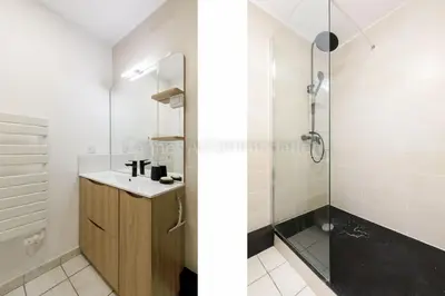 a bathroom with a shower and a sink at Palazzio RE in Cannes