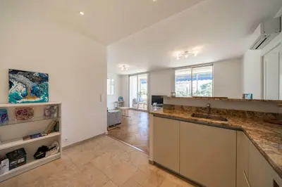 a kitchen with a sink and a counter top at Cozystay 1331 - 4-bedroom apartment La Croisette in Cannes