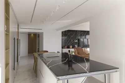 a kitchen with a black counter top in a room at Luxury Penthouse Montfleury by Halldis in Cannes