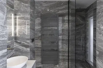 a bathroom with a shower with a toilet and a sink at Luxury Penthouse Montfleury by Halldis in Cannes