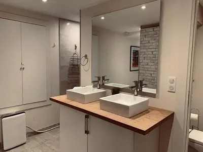 a bathroom with two sinks and a large mirror at C098- Cannes - Suquet Bel appart - Grande Terrasse in Cannes