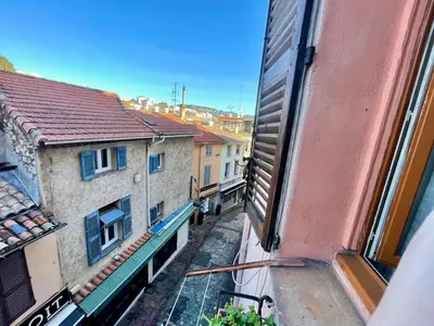 a view of an alley from a window of a building at Le Suquet Style IV by Connexion in Cannes