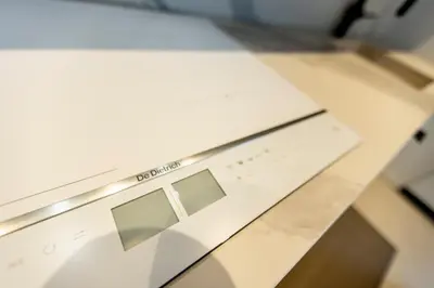 a dishwasher in a kitchen with a counter top at The RoofTop by Connexion in Cannes