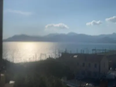 a view of a large body of water at Bord de mer et commerces 588 in Cannes