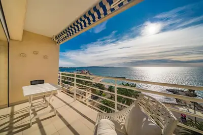 a balcony with a view of the ocean at Beautiful studio with great sea view in Cannes