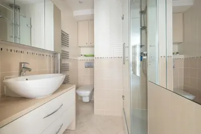 a bathroom with a sink and a glass shower at Wonderful studio heart of Cannes!! in Cannes