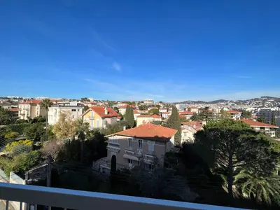 a view of a city from the balcony of a building at Cannes Santa Catalina in Cannes
