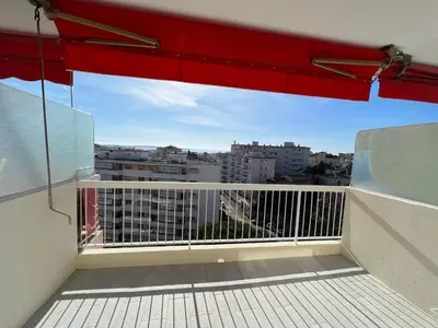 a balcony with a view of a city at Cannes Santa Catalina in Cannes