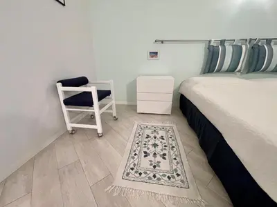 a bathroom with a white sink and a toilet at Le President II by Connexion in Cannes