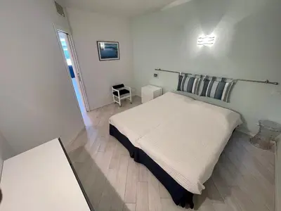 a bathroom with a blue sink and a shower at Le President II by Connexion in Cannes