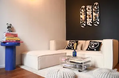 a living room with a couch and a table at T2 Cannes centre in Cannes