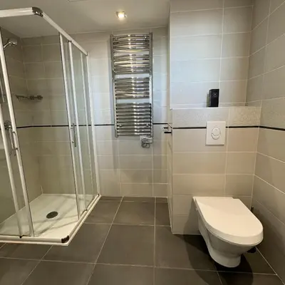 a bathroom with a shower and a toilet and a sink at Top Floor Secret Garden, Cannes in Cannes