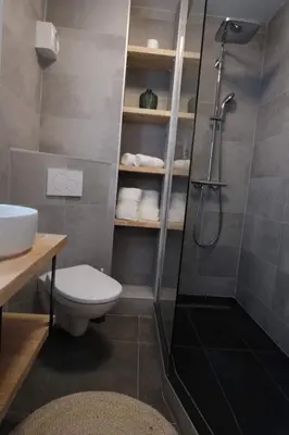 a bathroom with a shower and a toilet and a sink at Studio Cannes - 5mn Palais des Festivals (400m) in Cannes