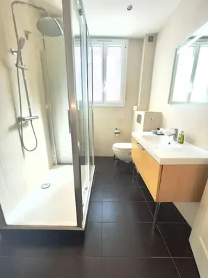 a bathroom with a shower and a sink and a toilet at Le Canada - 2Pièces Croisette plage derrière le Carlton calme in Cannes