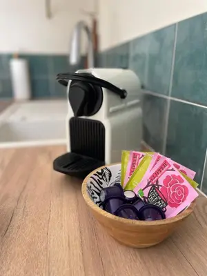 a bowl of chocolate in a kitchen with a coffee maker at Le Week Riviera III -3 étoiles-Plage du midi-Grande terrasse-Piscine-Cannes- Palais des Festivals in Cannes