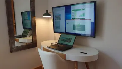 a computer monitor and a laptop sitting on a desk at B042-Functional apartment with balcony Suquet Cannes in Cannes