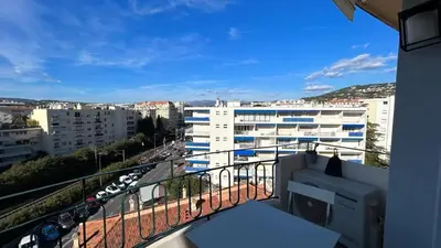 a balcony with a view of a city at B018-Bright apartment with balcony - Cannes Croisette in Cannes
